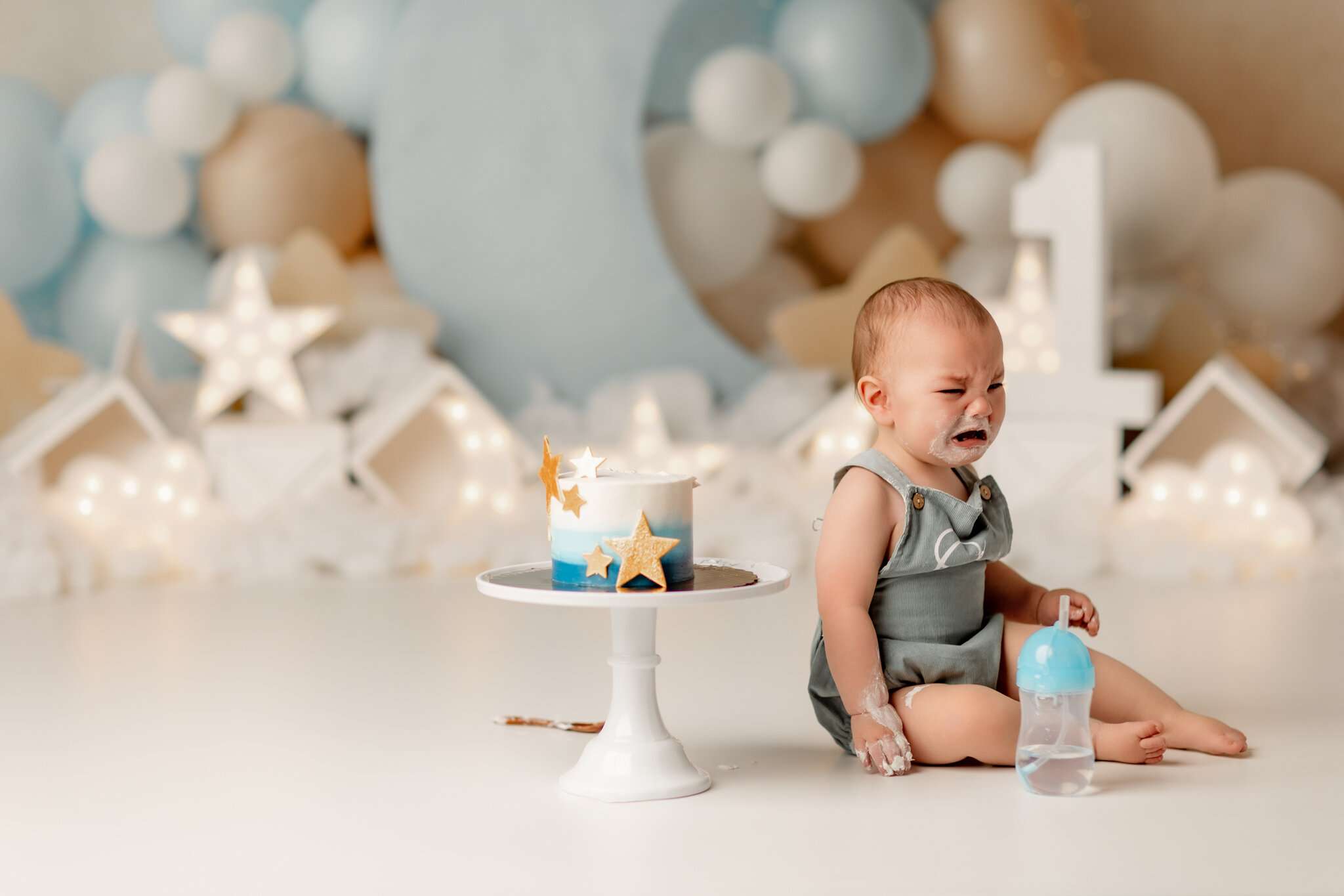 Bentonville AR cake smash photographer, NWA baby milestone session, first birthday photoshoot Fayetteville AR